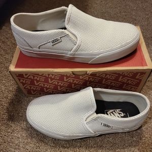 Vans white slip ons